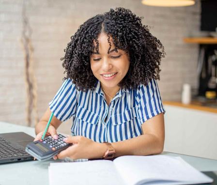 Online accounting student doing work on computer