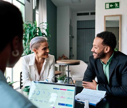 Financial manager speaking to clients