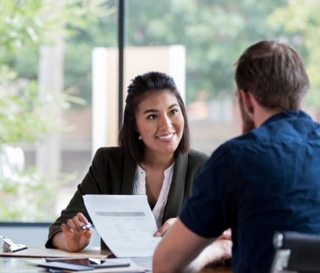 Man and woman in professional meeting